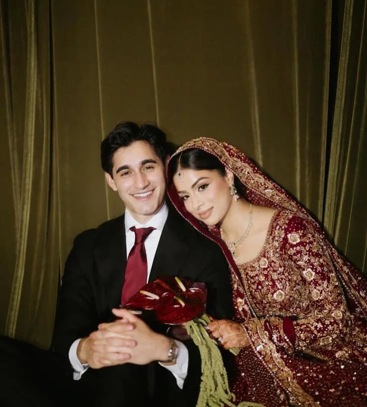 The groom leading the bride by the hand